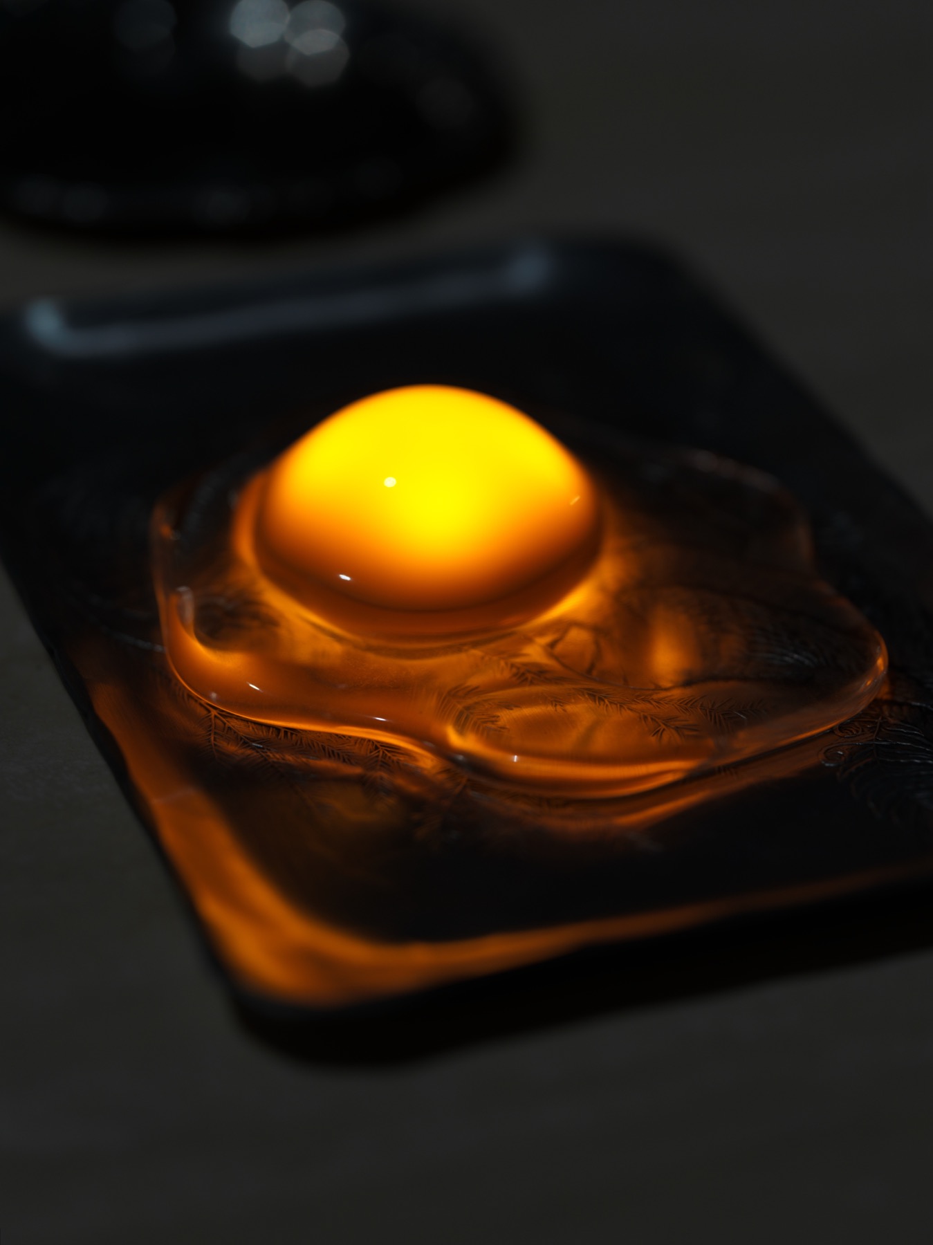 Close-up of the illuminated EL27 egg light